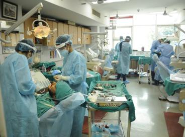 Dental treatment being performed at the institute following Covid protocol during the pandemic.